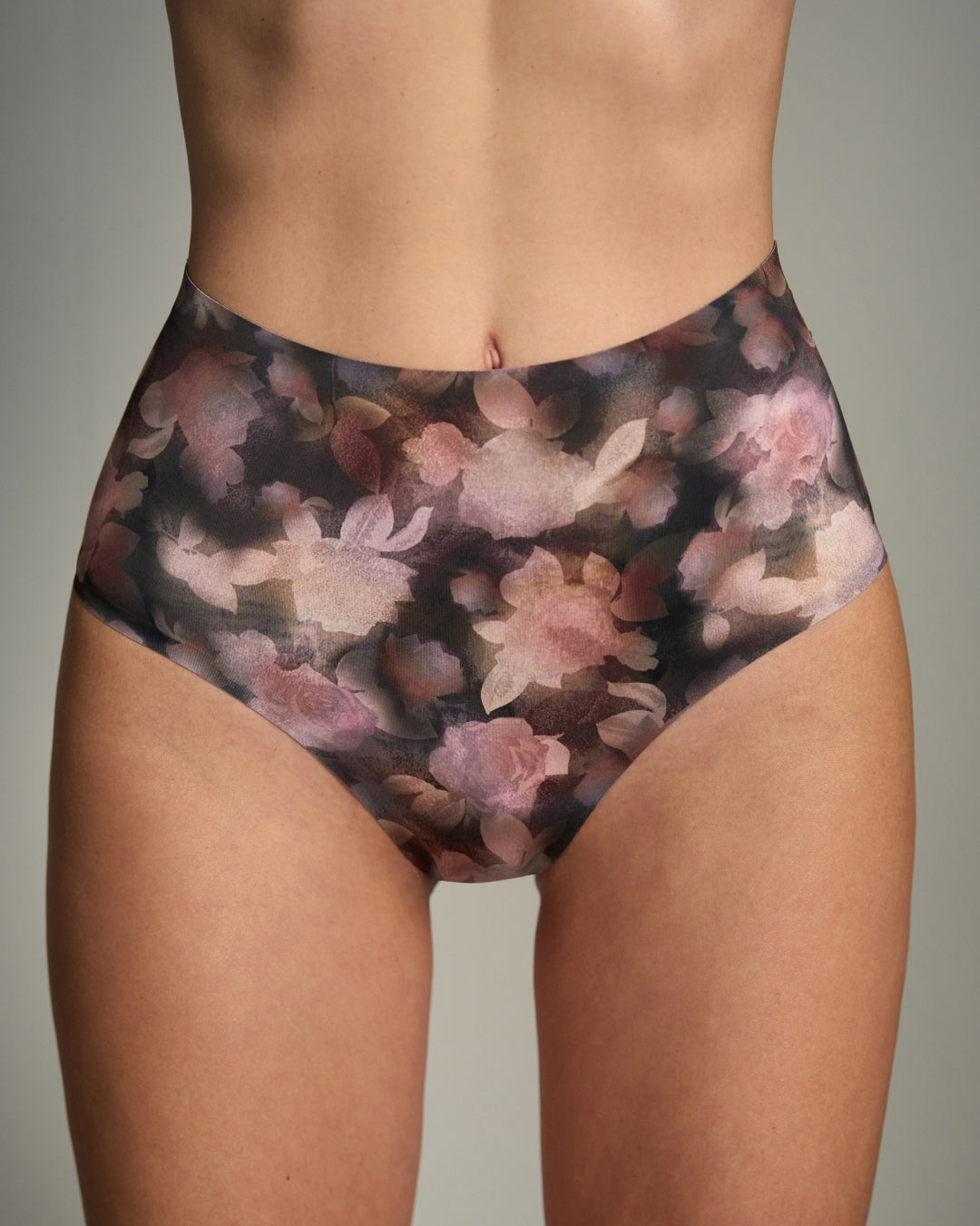 Floral patterned  Duskwild relief bra set worn by a person on a neutral background